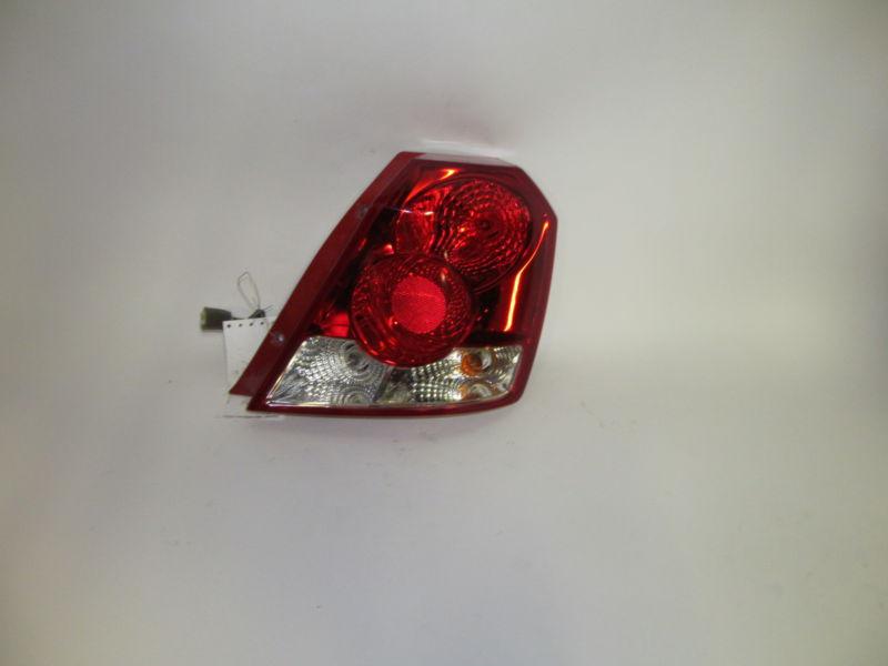 04 05 06 chevrolet aveo sedan oem right tail light nice!