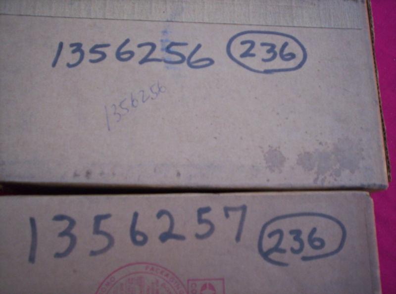 64 studebaker tail light lens retainers nos r&l