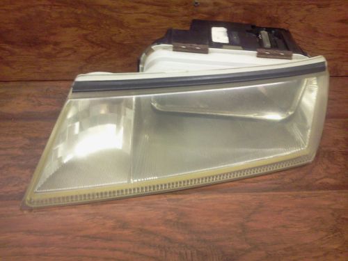 Left / driver headlight  -  lincoln continental  /  1995  1996  1997