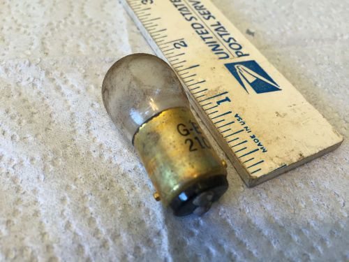 Ford; chrysler; gm; studebaker; old car light bulb,   pn 210.   item:  0019