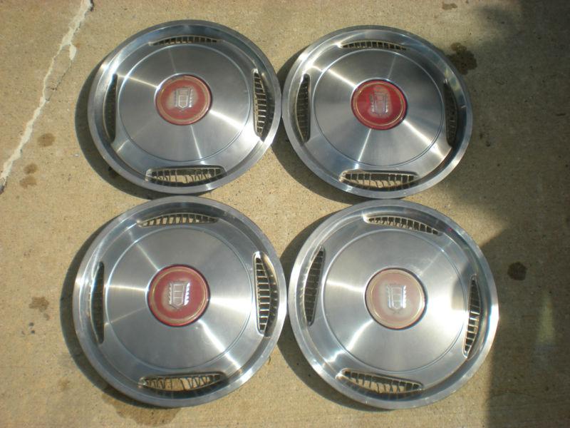 Set of four 15" cadillac wheel covers/ hub caps  