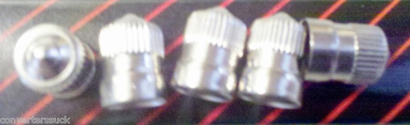 Vintage nos accessory  valve stem caps    ford