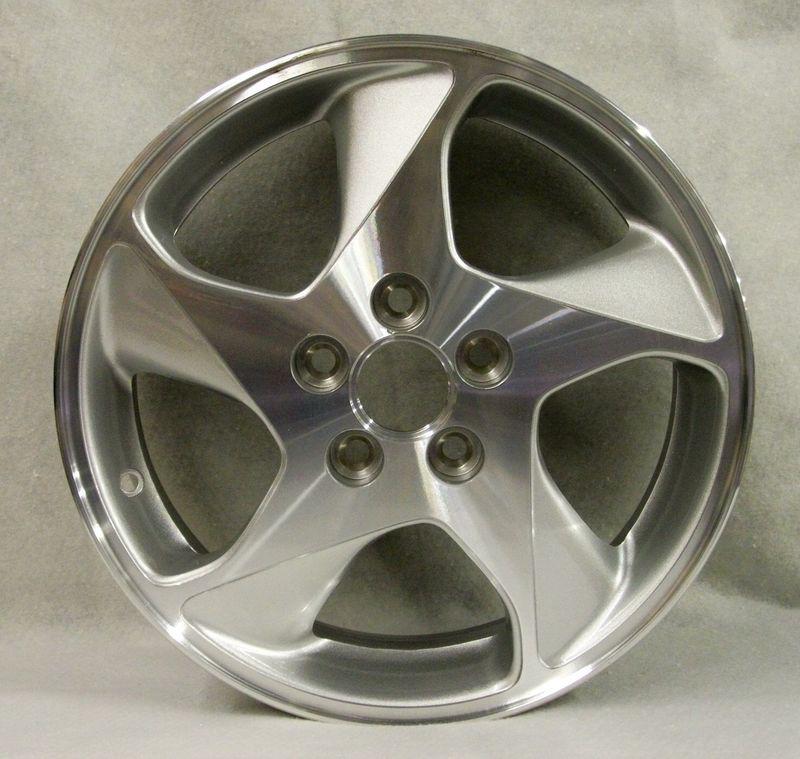 96/07 ford taurus wheel, 16x6  5 spoke machined alminun   