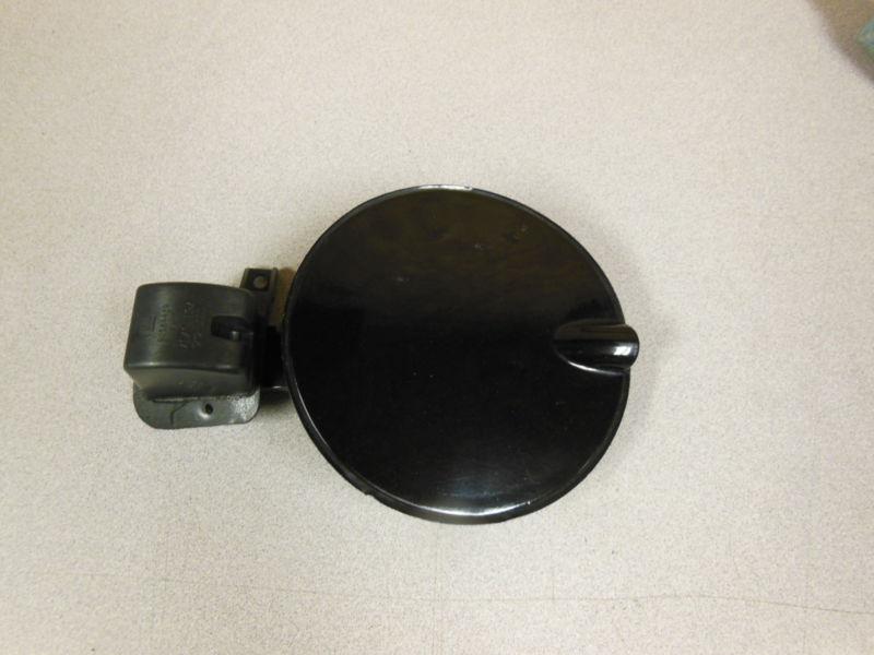 2000-2005 saturn l series  fuel / gas filler door black oem