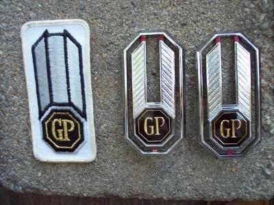 1981 82 83 pontiac grand prix tail light emblems with jacket patch nos