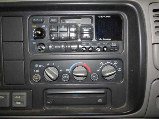 1997 chevy tahoe speedomter and radio trim dash bezel 2520437