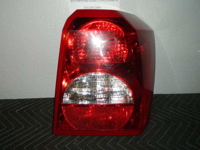 Oem 2007-2012  dodge caliber right /  passenger side tail light assembly 