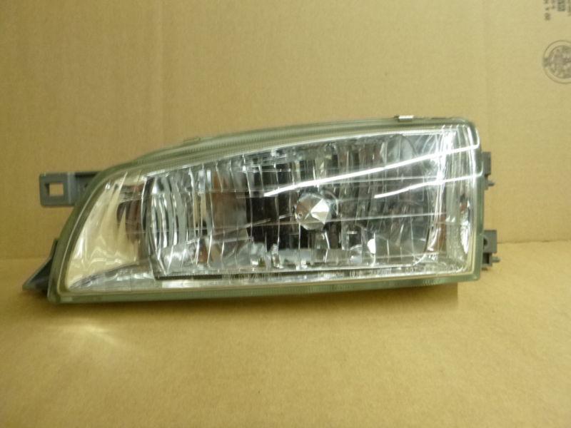 1993 - 2000 subaru impreza headlight assembly (oem) used left side