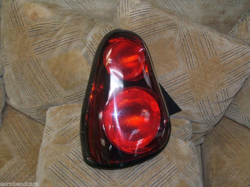 06 07 chevy chevrolet monte carlo left  ( driver )  origninal gm tail light