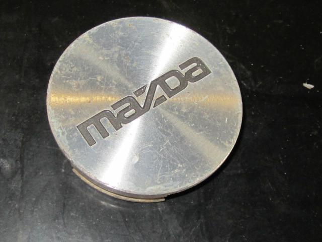 Mazda original equipment wheel center cap - aluminum   2.25 inch