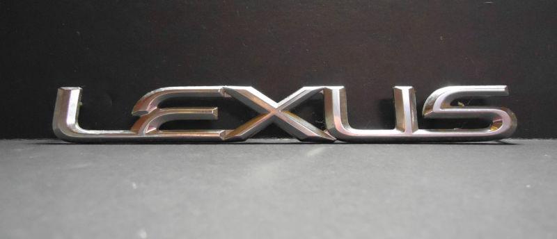 Used genuine toyota "lexus" nameplate consists of 7 pins- chrome - 7 5/8" x 7/8"