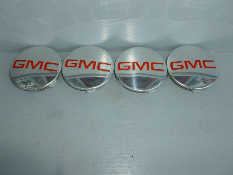 Gmc polished  center wheel  hub cap  w/ gmc  logo  part # 88963140 & 88963139