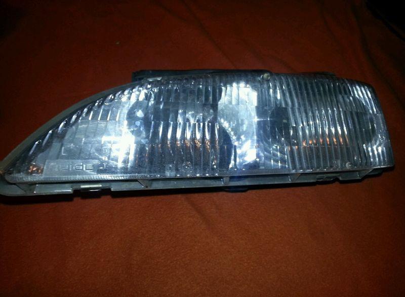 Left/driver side  95 96 97 98 99 chevy cavalier composite headlight