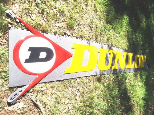 Dunlop tire letters wth sputnik with d,dunlop factory racing letters