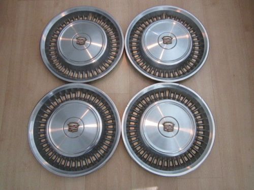 Vintage set of 4 (four) cadillac hub caps (approx. 16 1/8&#034; across the front)
