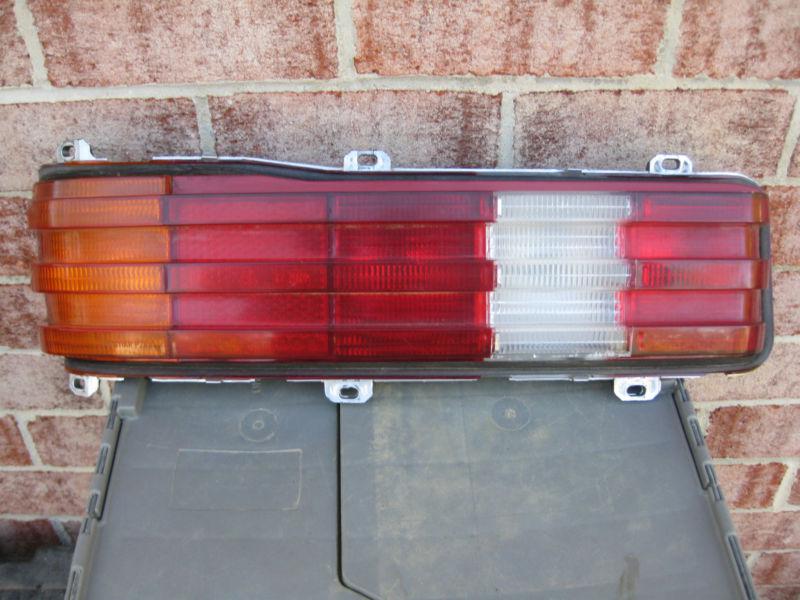 77-85 mercedes-benz w123 240d 300d 280e 230e driver side tail light genuine oem