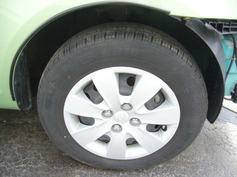 2008-2011 hyundai accent wheel cover 14in  7 spoke 2009 2010 08 09 10 11 oem