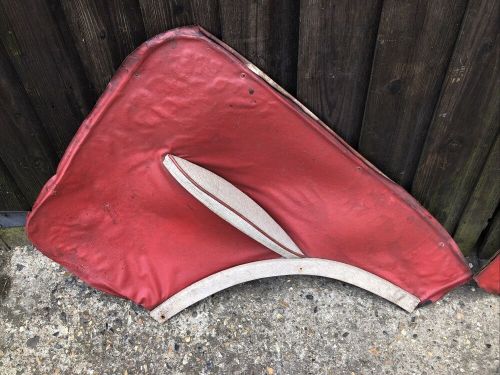 Red and white rear card morris minor 1000 2 door with arm rest