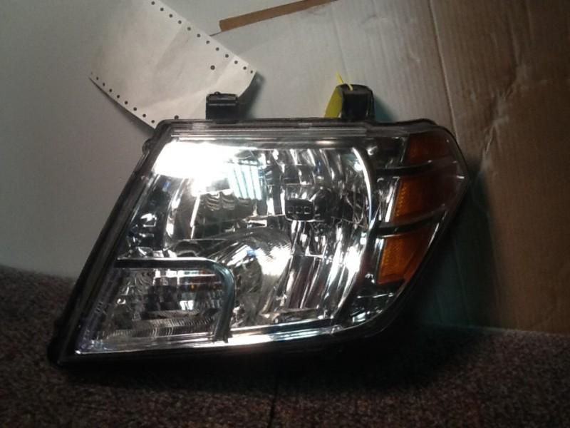 Nissan frontier headlight oem 09 10 11 12 13