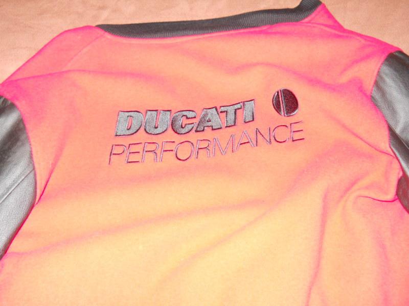 Ducati jacket size xl, new with tags,  made in italy, leather & wool type fabric