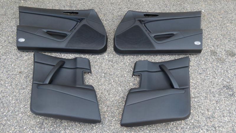 04-08  mazda rx8 set of black leather front n rear left n right door panel   h