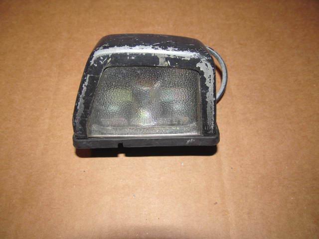 1982 83 toyota corolla right license plate tag light 