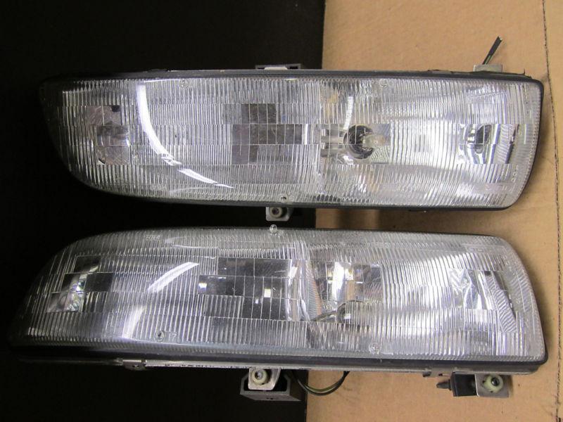 Buick regal 4 door sedan 93-96 1993-1996 headlight set passenger driver oe brite