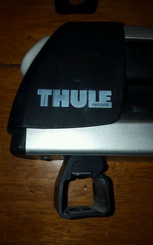 2 each thule ski racks for rectangular cross bars