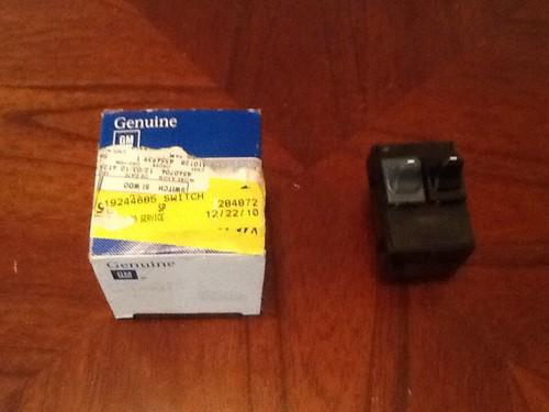 Genuine brand new gm pontiac grand am drivers side, 2-door window motor switch.