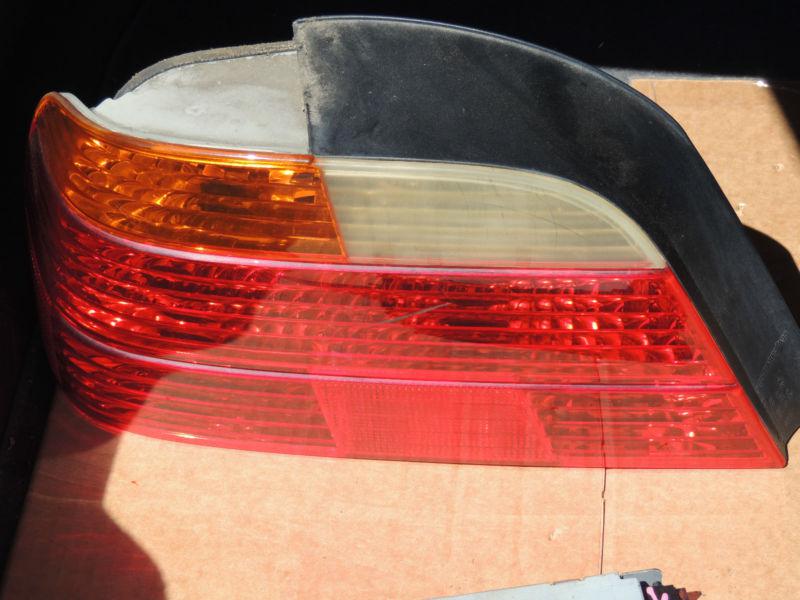 E38 740i tail light left oem. 63218360081