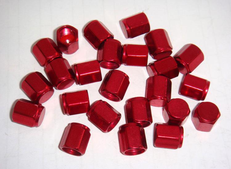 100 pcs. red anodized aluminum alloy valve stem & hex caps.