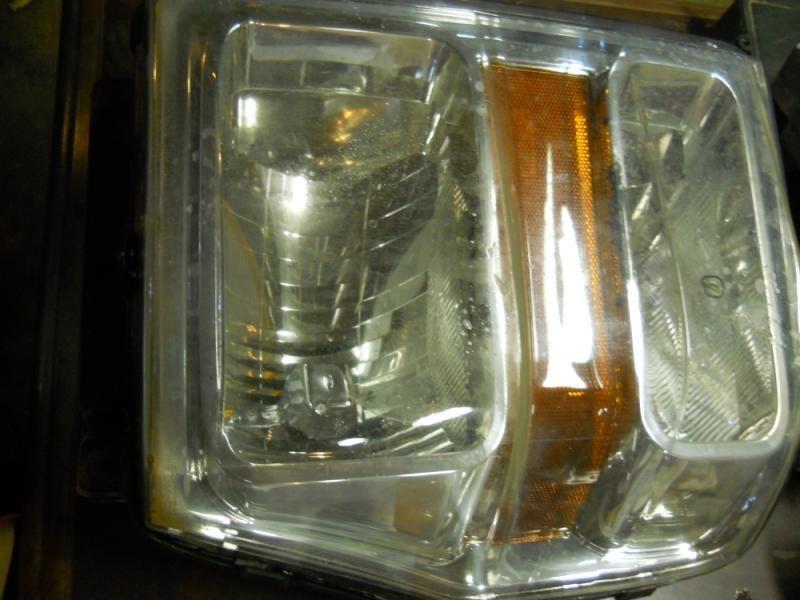 08 09 10 ford f250 super duty l. headlight 23910