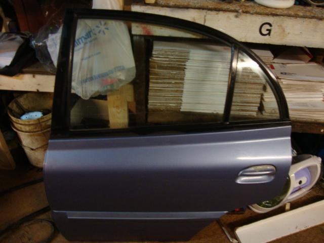 2004 kia rio 4dr sedan drivers side rear door oem