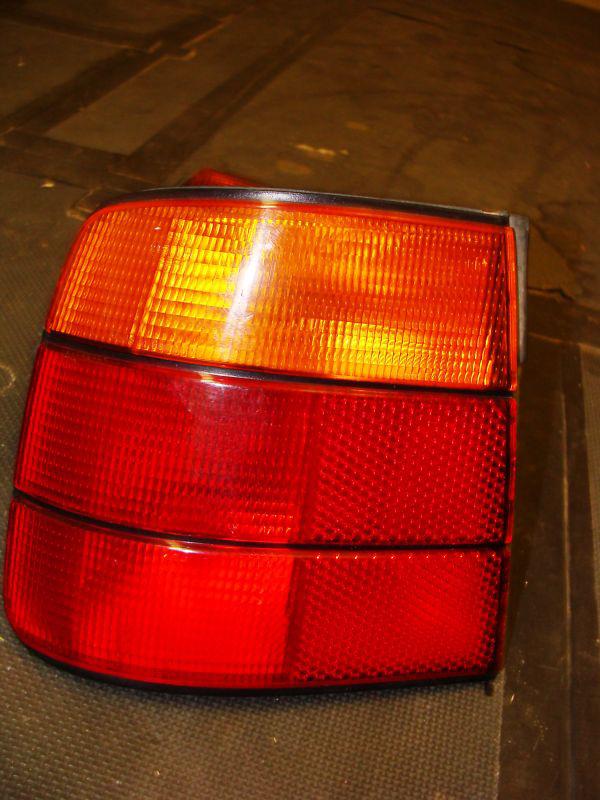 89-95 bmw 5-series left driver side oem red/amber outer tail light 