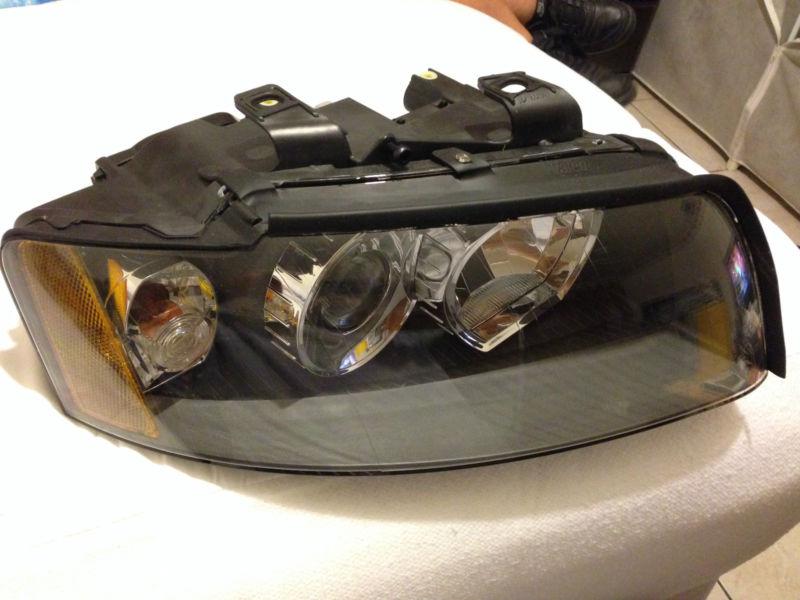 02-04 audi a4 oem xenon right headlight (new & complete)