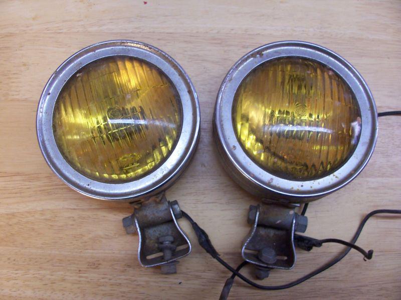 Vintage fog lights, nice pair, no pitting or dents, will polish up or rat rod em