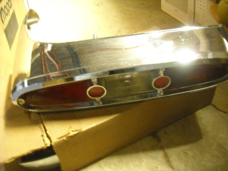 Mopar nos 1959 plymouth fury left tail light assembly, 1960029. 