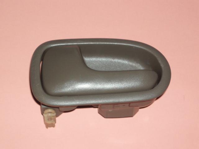 Mazda protege  inside door handle front left  door free s/h 1999-2000