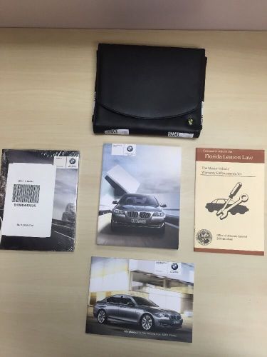 Bmw 5-series 2011 oem owner&#039;s manual w/ many supplements &amp; case