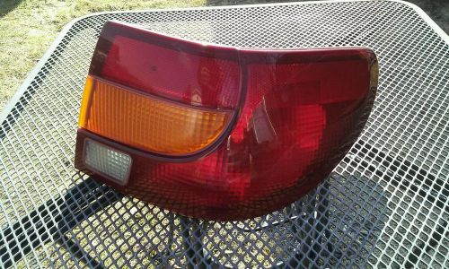 Saturn s tail light passenger side oem. 2000,2001,2002