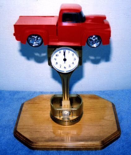 1956 ford f-150 red / piston clock mounted on 11 x 9 oak wood plaque