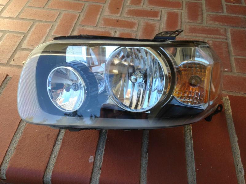 01 02 03 04 ford escape left (driver side) headlight oem, factory