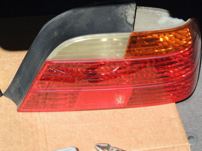 E38 740i tail light left oem. 63218360081 right passenger