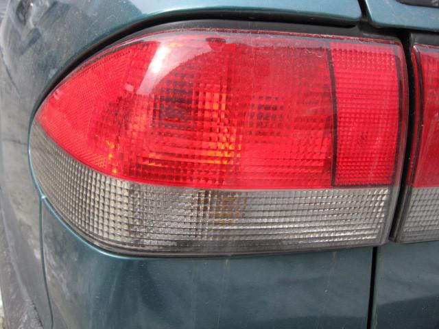 Tail light saab 900 1995 95 96 97 98 quarter mount left 394378