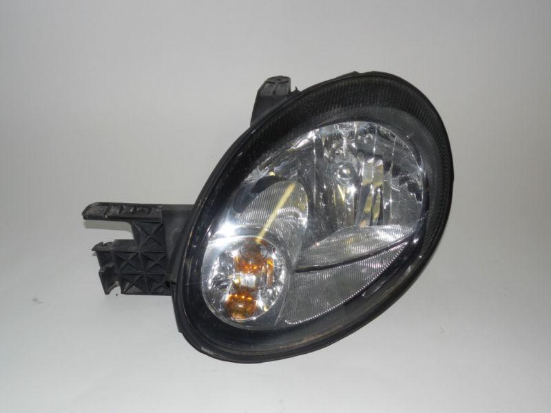 03 04 05 dodge neon oem left headlight nice! 