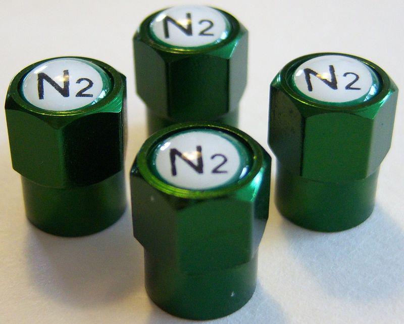  4  aluminum green (nitrogen) valve stem caps 