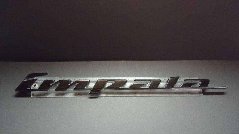 Used genuine gm chevy "impala" nameplate emblem fits front side door or trunk 