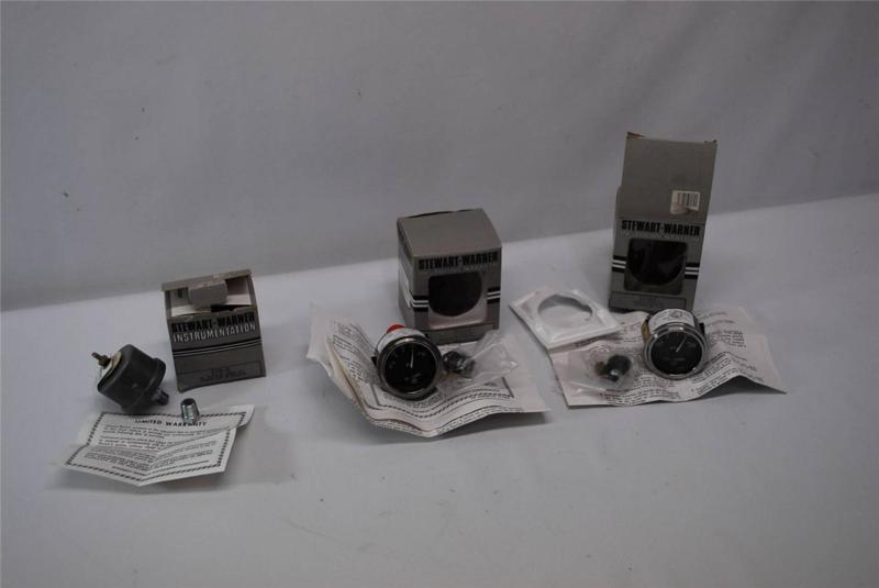 Pair of stewart warner gauges and 1 sending unit as pictured all are nos