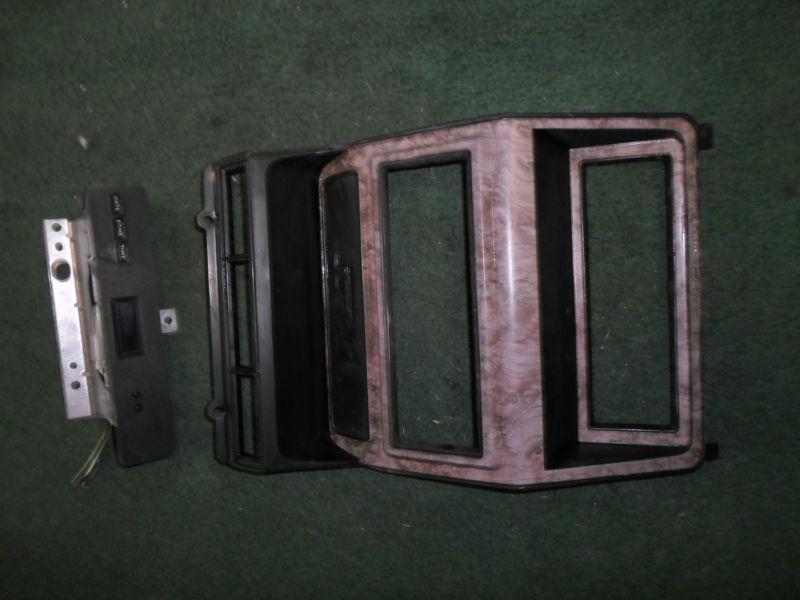 1980-1986  xlt ford truck  bronco wood grain dash radio bezel w/digital clock