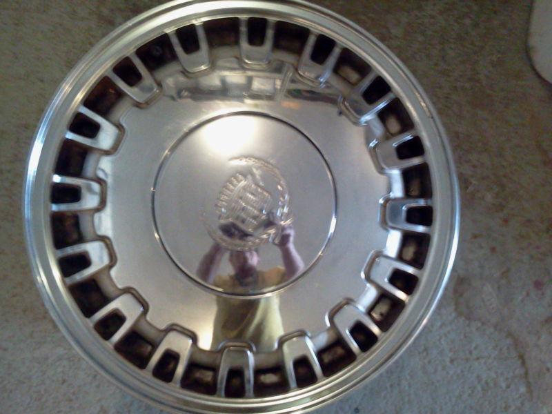 * 16 inch factory rim -  cadillac - deville, eldorado, seville, etc - chrome